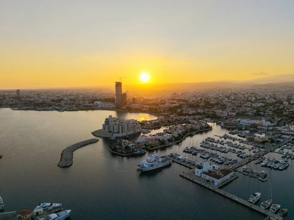 Limassol marina and the city seen from above at sunset